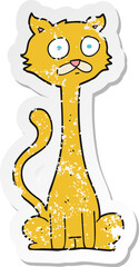 retro distressed sticker of a cartoon cat