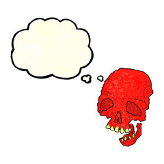 cartoon spooky skull with thought bubble