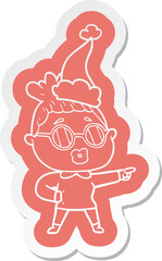 quirky cartoon  sticker of a pointing woman wearing spectacles wearing santa hat