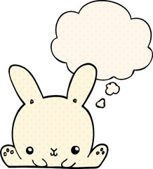 cartoon rabbit with thought bubble in comic book style