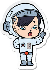 Fototapeta premium sticker of a cartoon astronaut woman