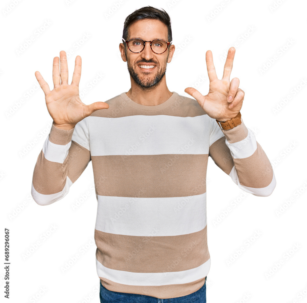 Canvas Prints Handsome man with beard wearing casual clothes and glasses showing and pointing up with fingers number eight while smiling confident and happy.