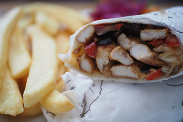 chicken warp and fresh salad on table 