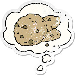 cartoon cookies with thought bubble as a distressed worn sticker