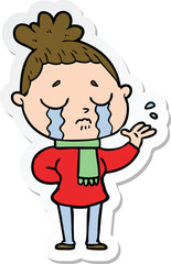 sticker of a cartoon crying woman