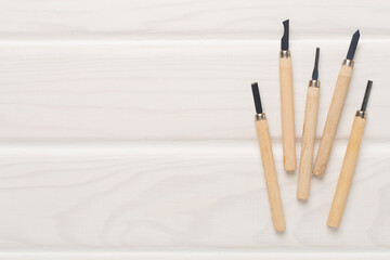 Carpenter tools on wooden background,top view