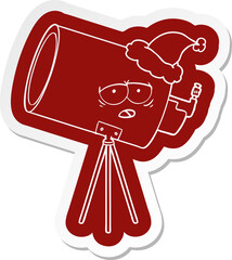 quirky cartoon icon of a bored telescope with face wearing santa hat