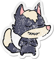 distressed sticker of a friendly cartoon wolf