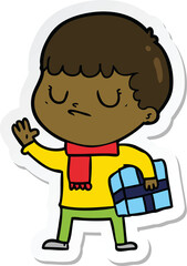 sticker of a cartoon grumpy boy