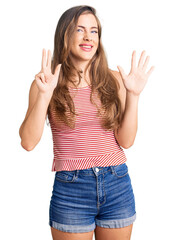 Beautiful caucasian young woman wearing casual clothes showing and pointing up with fingers number eight while smiling confident and happy.