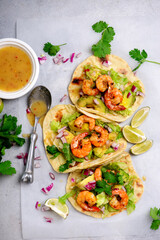 Shrimp taco with hot sauce and lime.style hugge.