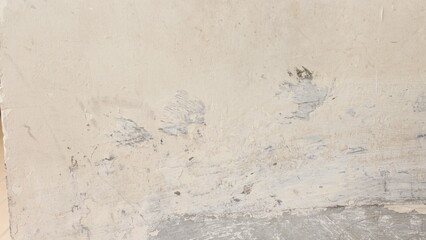 white cement patches on damaged walls