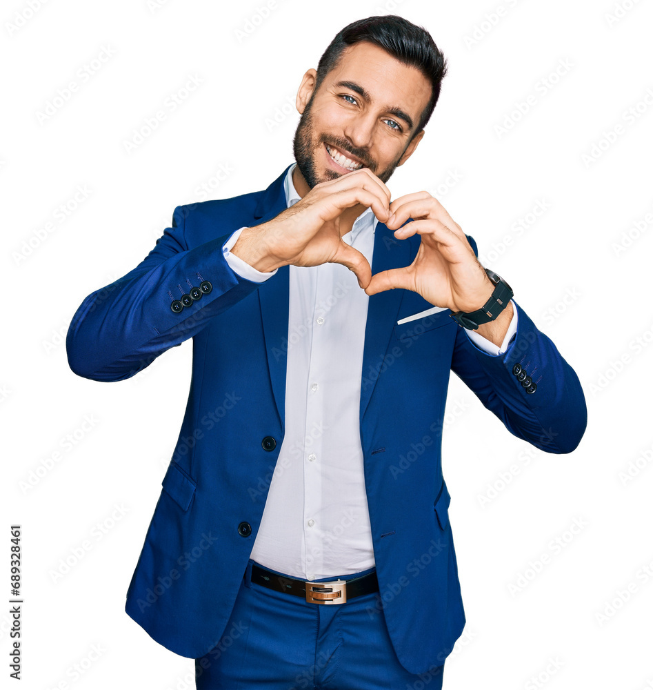 Poster young hispanic man wearing business jacket smiling in love doing heart symbol shape with hands. roma