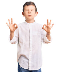 Cute blond kid wearing elegant shirt relaxed and smiling with eyes closed doing meditation gesture with fingers. yoga concept.