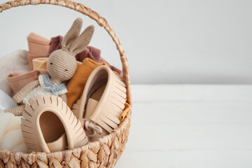 Gift basket for baby on table, closeup