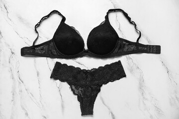 Stylish female underwear on light background