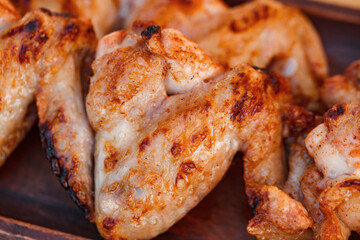 Barbecue chicken wings fried, crispy crust, close-up,  selective focus