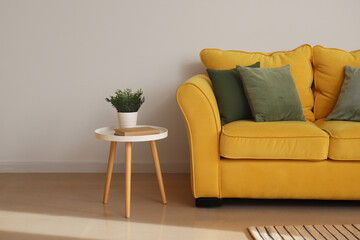Interior of modern room with yellow sofa