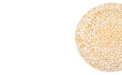 Fototapeta na wymiar Woven Corn Leaf Napkin. Dry woven round napkin in close-up