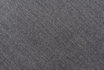 Texture of black carbon fabric. Textile. Background of dark fabric for tailoring
