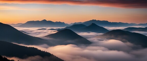 sunrise view over the foggy mountains

