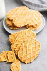Round waffle biscuits on kitchen table.