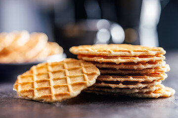 Round waffle biscuits on kitchen table.