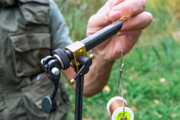 Fishing fly making machine