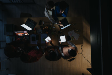 Top View of Collaborating Coworkers Discussing Business Growth Strategy.