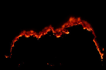 burning paper, glowing edge of paper on a black background