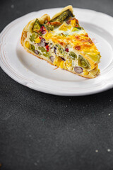 open pie quiche vegetable savory baked corn, green peas, beans, green beans, bell pepper healthy eating cooking appetizer meal food snack on the table copy space food background