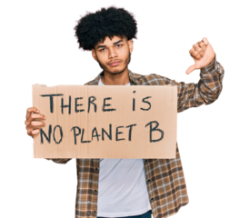 Young african american man with afro hair holding there is no planet b banner with angry face, negative sign showing dislike with thumbs down, rejection concept