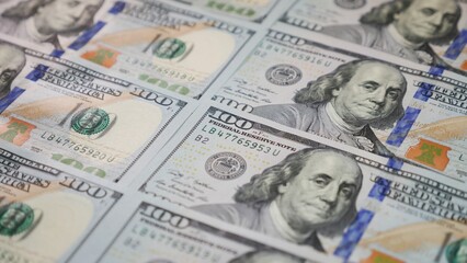 A lot of one hundred dollar bills