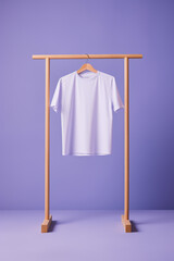 White t-shirt hanging on a wooden hanger
