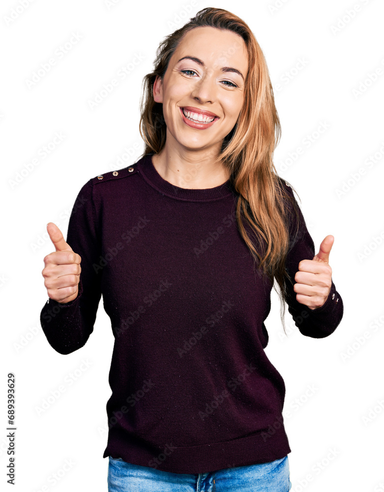 Poster Young caucasian woman wearing casual clothes success sign doing positive gesture with hand, thumbs up smiling and happy. cheerful expression and winner gesture.