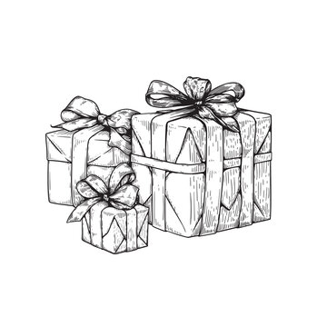 Hand drawn sketch gift boxes with bow and ribbon. Best for birthday, festive events designs. Vector illustration on white.