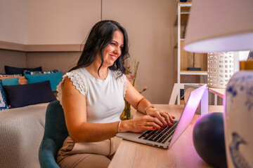 Woman using laptop to work from home