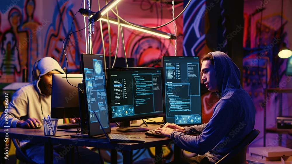 Poster asian hacker arriving in underground bunker, ready to do data breaches and financial theft. rogue co