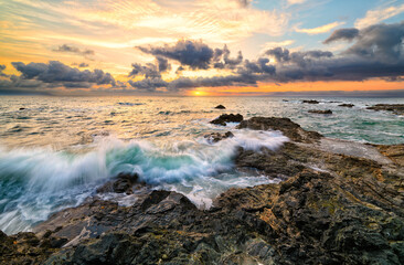 Fototapeta premium Sunset Ocean Beach Landscape Surreal Nature Sunrise Sea Rocks Coastline Scenic High Resolution