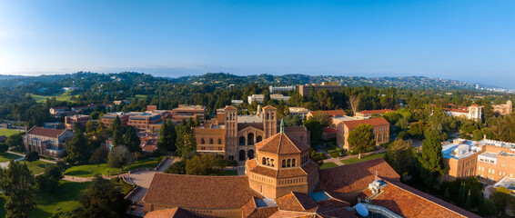 Aerial view of UCLA campus in Westwood, Los Angeles, featuring red-brick, Gothic, and modern...