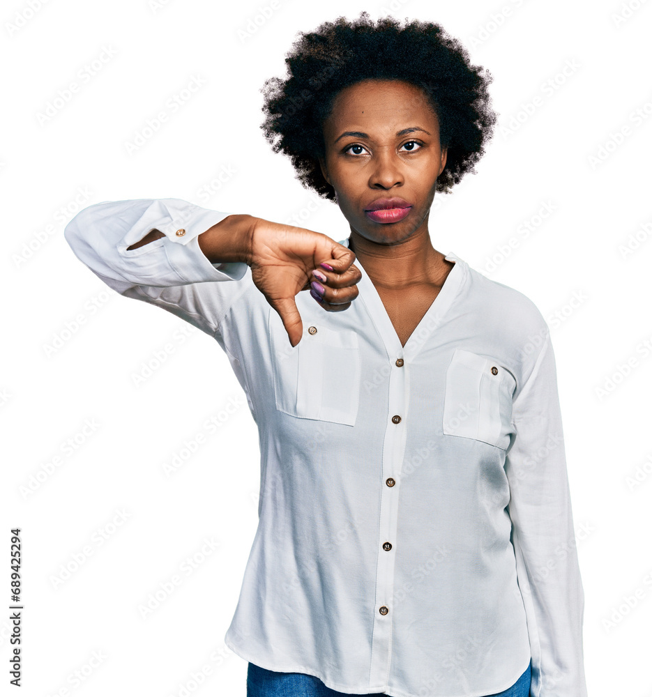 Poster african american woman with afro hair wearing casual white t shirt looking unhappy and angry showing