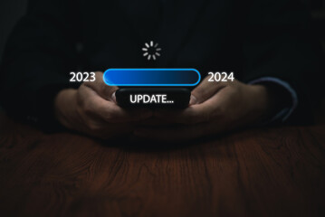 update progress bar to 2024 Businessman using mobile phone investment and planning marketing...