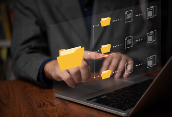 IT working on computer Business processes Document Management System DMS business processes and ensuring digital security. store, share, and organize documents and files..