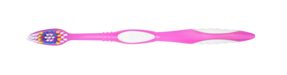 Pink plastic toothbrush isolated on white, top view