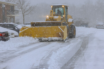 During heavy snowfalls, snowplows are used to clear parking lots