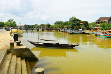 Hoi An, Vietnam October 28, 2023. Old buildings with the river in Hoi An, Vietnam. The historic old town of Hoi An is UNESCO World Heritage Site since 1999. This was during a hot day in wet season.