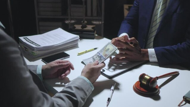 Businessman or accountant is rejecting and resisting partner bribery deals in joint financial settlement, illegal anti-bribery ideas. In work