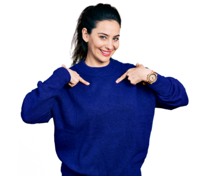 Young hispanic woman wearing casual clothes looking confident with smile on face, pointing oneself with fingers proud and happy.