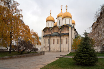 Fototapeta na wymiar Assumption Cathedral on Cathedral Square in the Moscow Kremlin on an autumn day, Moscow, Russia