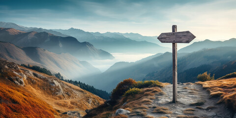 road signpost, guiding travelers against the backdrop of a misty, mountainous landscape - obrazy, fototapety, plakaty